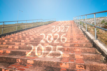 Stairs with numbers on each step represent the new year 2025, 2026, 2027, 2028, the idea of ​​starting off in the new year.