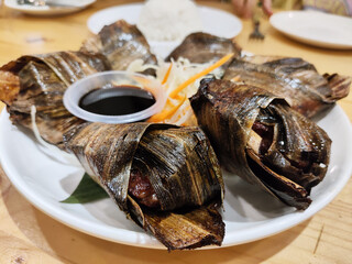 Thai chicken pandan on white plate