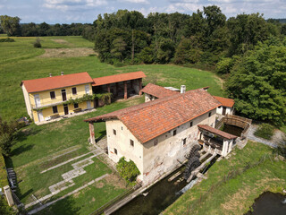 Fototapeta premium Drone view at the watermill of Bellinzago Novarese in Italy
