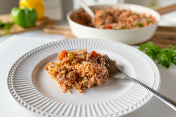 Plate with healthy food cooked with rice, vegetables and tuna