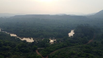Obraz premium Huge open mine at the brink of the rainforest in Brazil