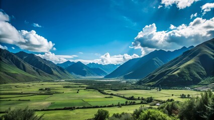 Obraz premium A charming valley view providing a wide area for text, accented by stunning mountain ranges, a serene blue sky, and a sweeping landscape of greenery.
