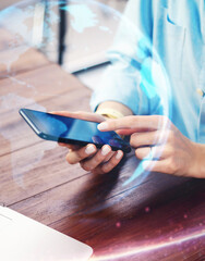 Close-up photo of female hands with smartphone. Concept of networking or remote work. Global business network.