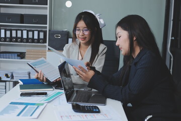 Team of business people are meeting to analyze data for marketing plan,Market research reports and income statistics, Financial and Accounting concept.