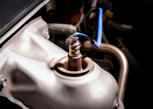 O2 sensor or oxygen sensor on exhaust pipe for measures the level of oxygen remaining from combustion in engine exhaust , Car parts concept