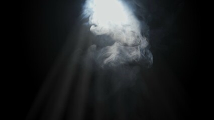 Soft diffused rays of light cut through the hazy darkness.