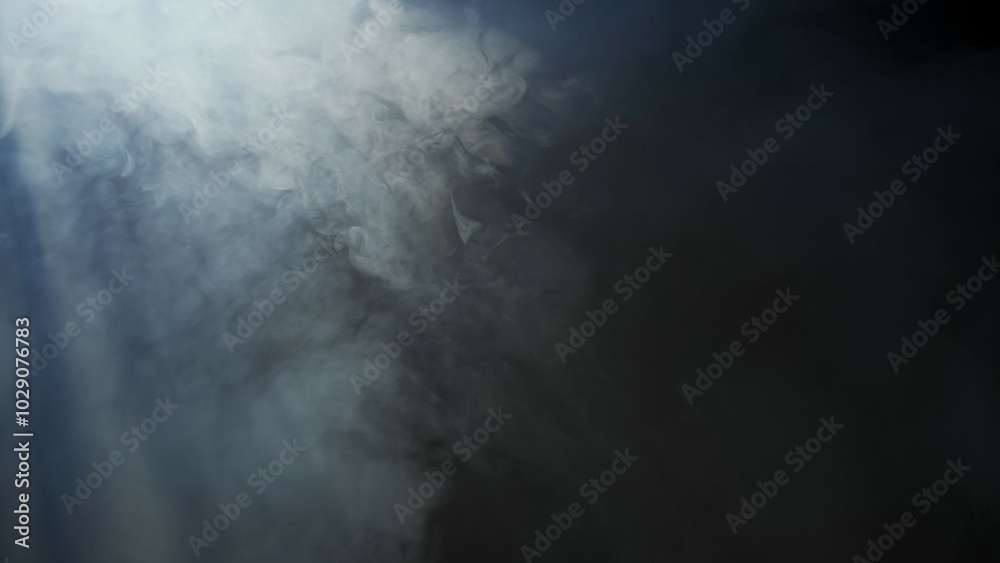 Wall mural soft diffused rays of light cut through the hazy darkness.