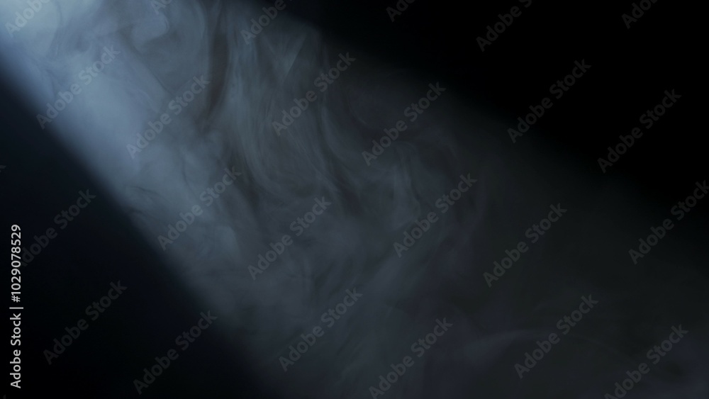 Wall mural soft diffused rays of light cut through the hazy darkness.