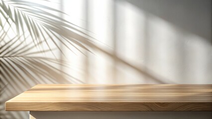 Obraz premium The interplay of light and shadow on a natural wooden surface creates an inviting backdrop for luxury skincare presentations.
