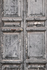 Old wooden door in the old town of Rome, Italy
