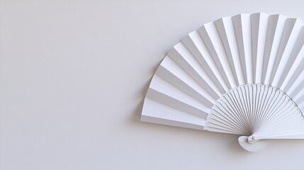 A clean white folding fan mockup, set apart on a seamless white background with focus on its pleats and handle.