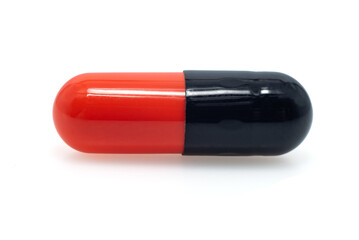 Tablets, colored capsules on a white background. Medicines