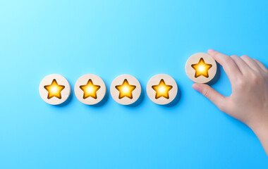 Obraz premium Customer satisfaction and feedback rating concept. A hand places a five-star rating on row of glowing stars, representing customer reviews, satisfaction, and feedback for quality services or products.