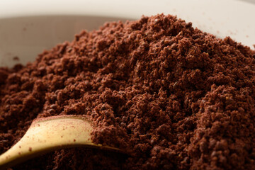 high resolution macro photography of dried and ground sumac seeds, a ready-made spice