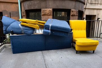 Discarded Couch and Chair on the Sidewalk in New York City