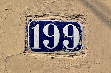 Street sign number 199 on wall in the Tijuca neighborhood, Rio de Janeiro, Brazil