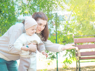 Fototapeta premium Mother and Son Enjoying a Day Outdoors