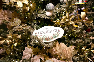 Beautiful festive snowflake decoration on the Christmas tree. Close-up. Beautiful Christmas background. The concept of decorations and decor for the new year. New Year's Card 2025