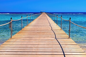 Fototapeta premium Idylic beach with wooden jetty, Red Sea, Egypt