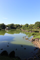 Ryotei House and Dai-Sensui Pond in Kiyosumi Garden, Tokyo, Japan