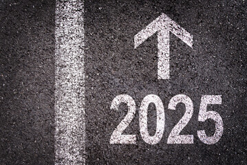 Direction 2025 written on asphalt road background, new year business goal illustration