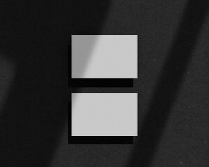 Top view two business card mockup on paper background with shadow overlay