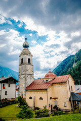 A charming church that features a clock tower elegantly perched on its roof