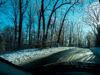 driving on icy suburban road in winter	