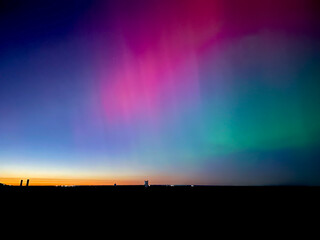 Stunning, dreamy display of vivid colors seen from aurora borealis, northern lights over Long...