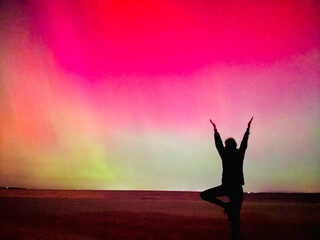 Stunning, dreamy display of vivid colors seen from aurora borealis, northern lights over Long...