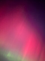 Stunning, dreamy display of vivid colors seen from aurora borealis, northern lights over Long...