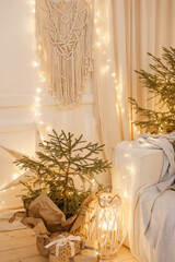 Designer Christmas tree decoration with light decorations. The concept of celebrating New Year and...