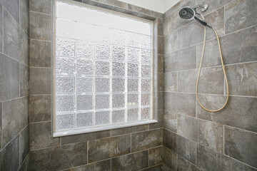 Modern Tiled Shower With Large Glass Block Window