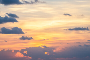 Skyscape sunset, colorful clouds and sun behind cloudy formations nature landscape