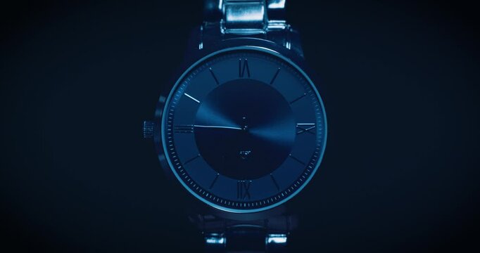 Close up of a ticking watch face