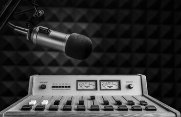 Professional microphone and sound mixer in radio station studio