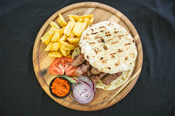 A delectable image of minced meat rolls, showcasing a golden-brown exterior and garnished with herbs, perfect for highlighting savory dishes.