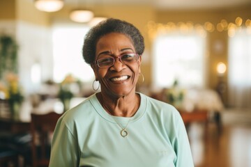 Obraz premium Portrait of a elderly African American woman smiling in nursing home