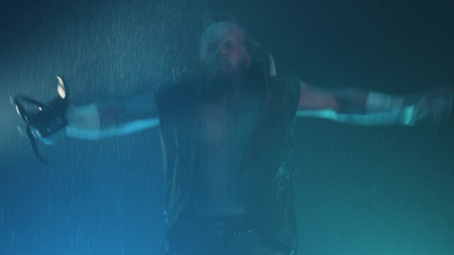 Pro wrestler spitting water into the air