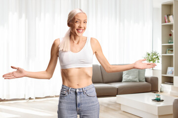 Cheerful skinny female in a living room