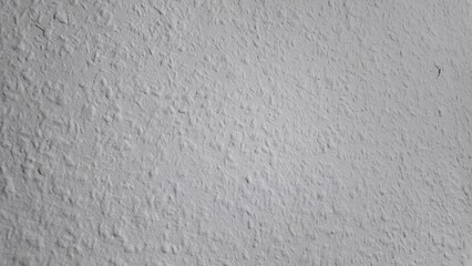 Textured White Wall With Subtle Patterns in Natural Light Indoors