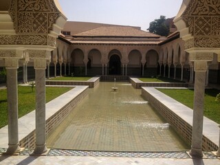 the courtyard of the El Mechouar palace with its water jets, and Arab-Islamic architecture. Tlemcen. Algeria	