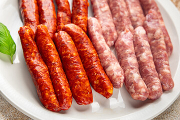 raw meat sausages beef, pork, chicken, lamb, dish fresh delicious gourmet food background on the table rustic food top view copy space