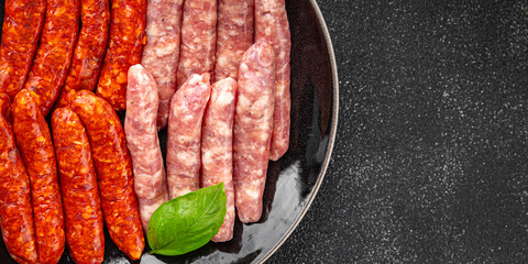 raw meat sausages beef, pork, chicken, lamb, dish fresh delicious gourmet food background on the...