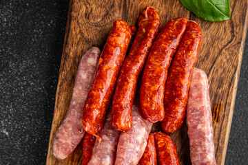 raw meat sausages beef, pork, chicken, lamb, dish fresh delicious gourmet food background on the table rustic food top view copy space