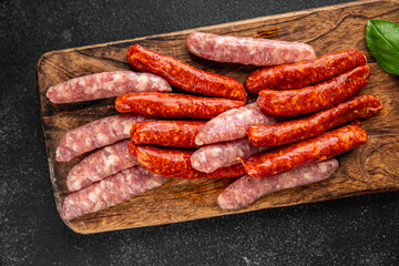 raw meat sausages beef, pork, chicken, lamb, dish fresh delicious gourmet food background on the table rustic food top view copy space