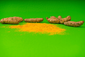 Curcuma longa - Turmeric is a very healthy species in spoon and bowl