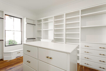 Walk-In Closet With Ample Shelving And Storage Space