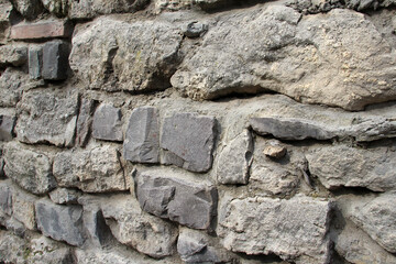Old wall built of natural stone