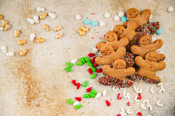 Christmas gingerbread man ginger cookie party dessert christmas treat delicious gourmet food background on the table rustic copy space top view